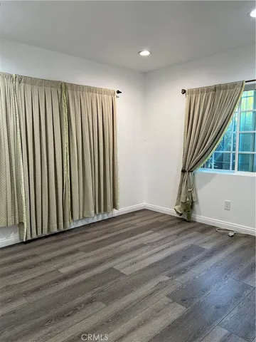 a view of kitchen with wooden floor