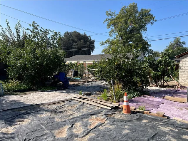 a backyard of a house with lots of green space