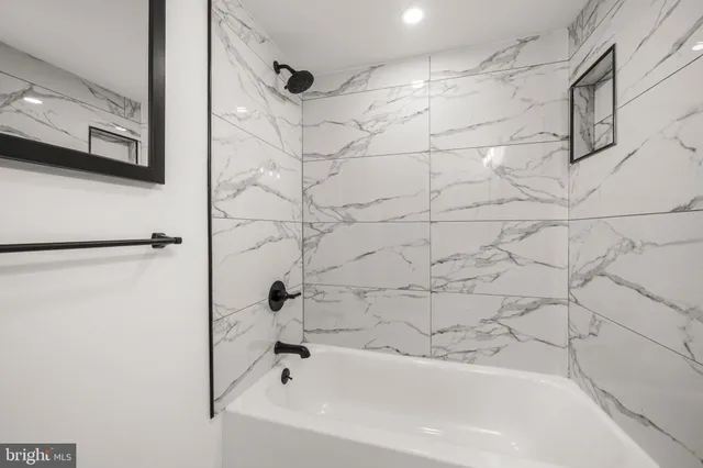 a bathroom with a bathtub