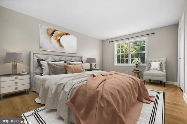 a bedroom with bed and window