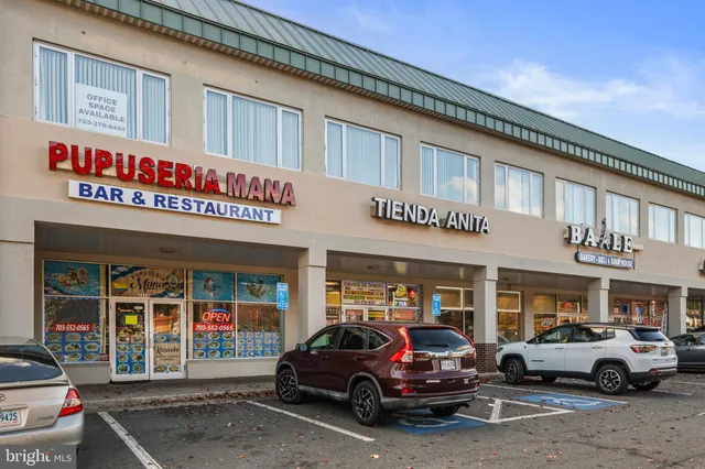 a view of a car park in front of building