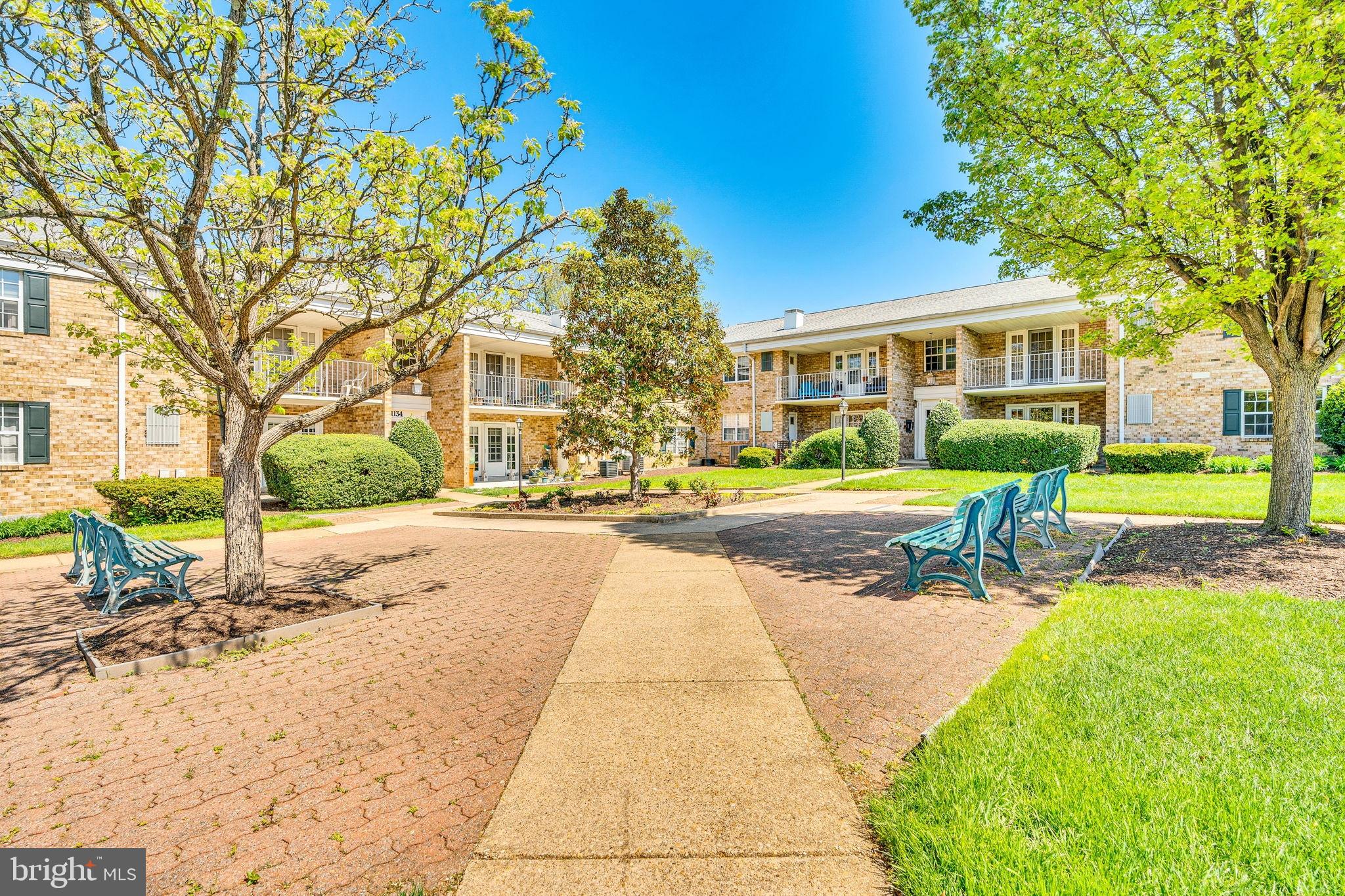 1134 South Washington Street, Unit T1 Falls Church, VA 22046 - Photo 33 of 34 a view of house with yard and sitting area