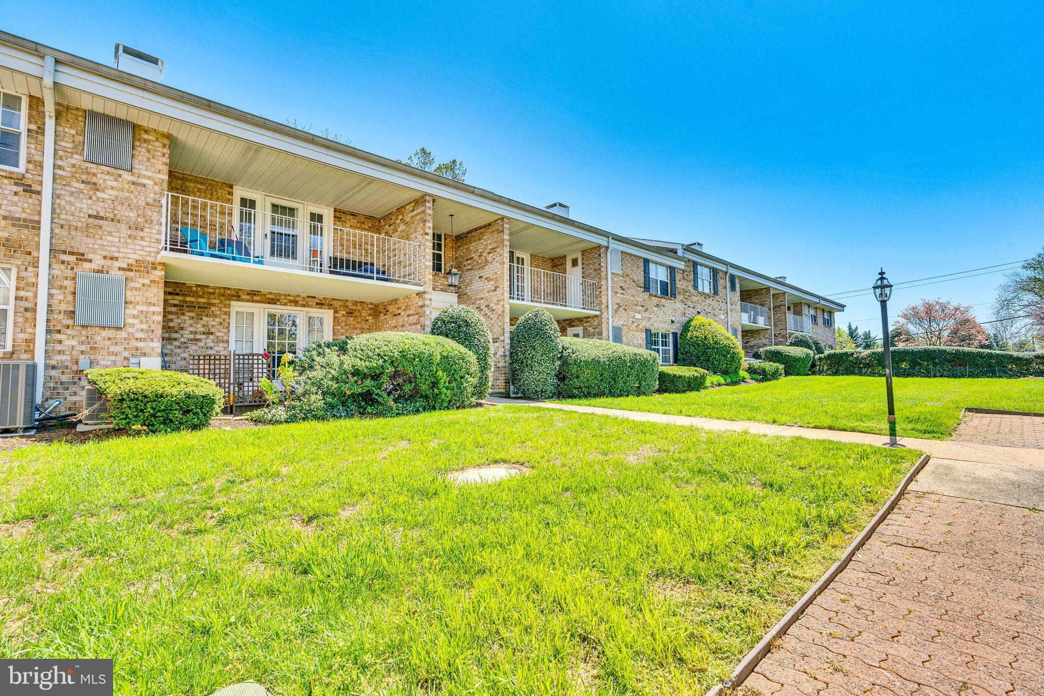 1134 South Washington Street, Unit T1 Falls Church, VA 22046 - Photo 34 of 34 a view of an house with backyard and swimming pool