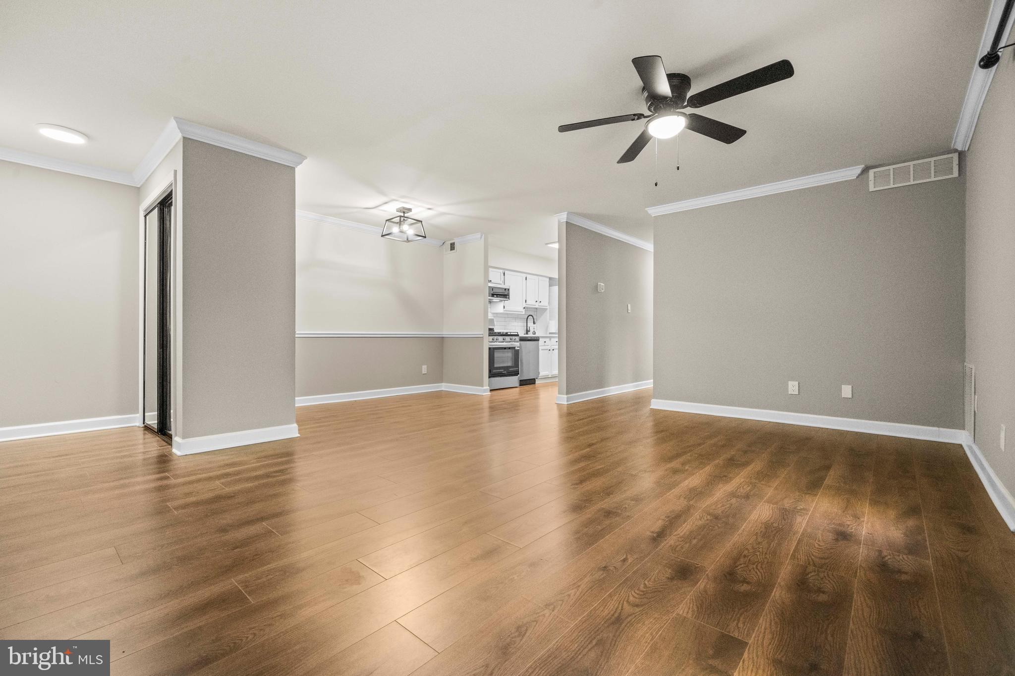 1134 South Washington Street, Unit T1 Falls Church, VA 22046 - Photo 7 of 34 a view of an empty room with a window