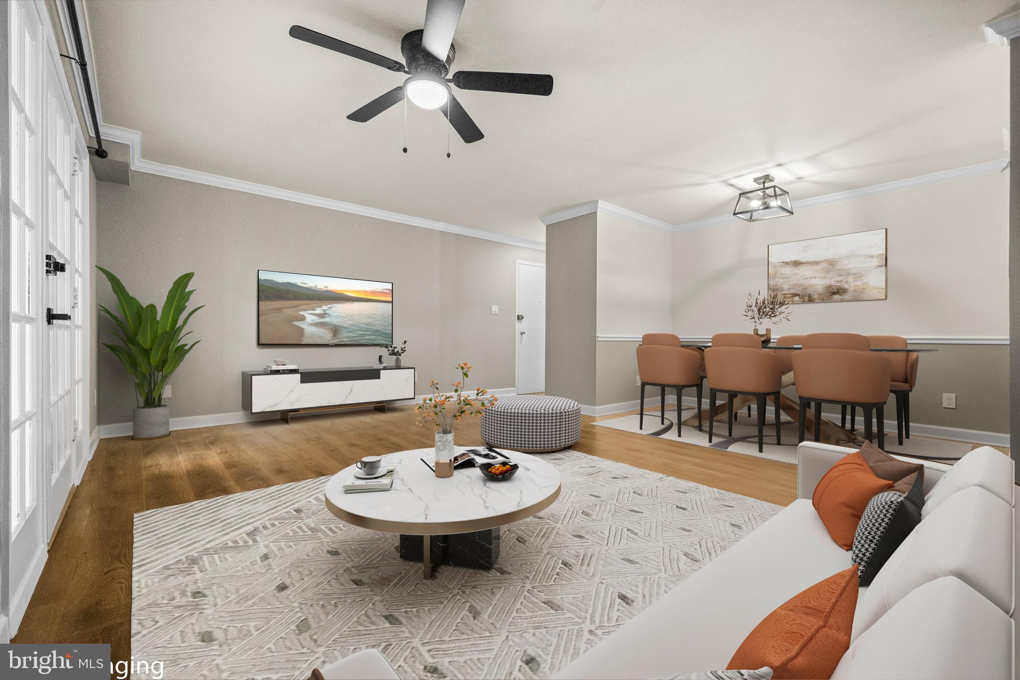 1134 South Washington Street, Unit T1 Falls Church, VA 22046 - Photo 9 of 34 a living room with furniture and a wooden floor