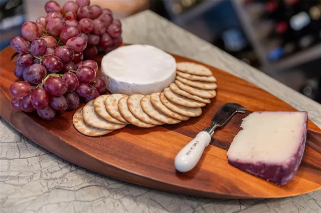 a bedroom with a bed and a chair