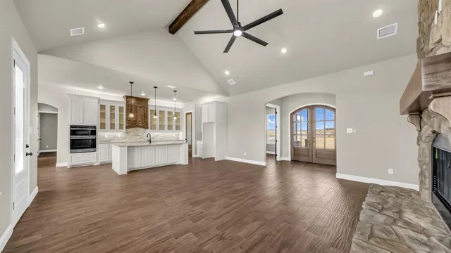 a view of kitchen with stainless steel appliances refrigerator oven and stove
