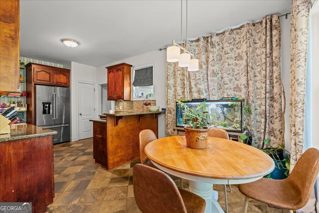 a dining room with window