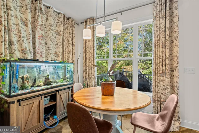 a kitchen with stainless steel appliances granite countertop a sink stove and a refrigerator