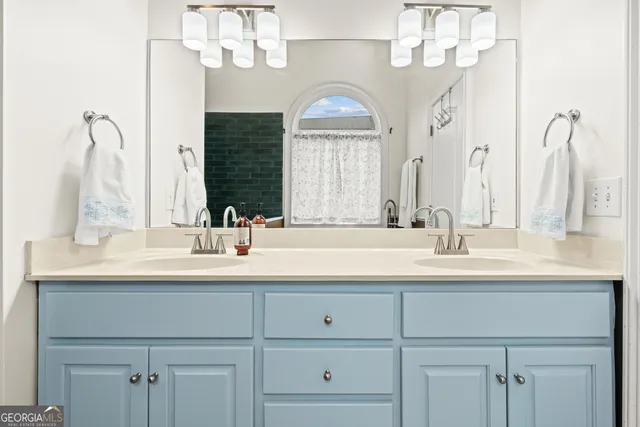 a view of a door and chair in the balcony