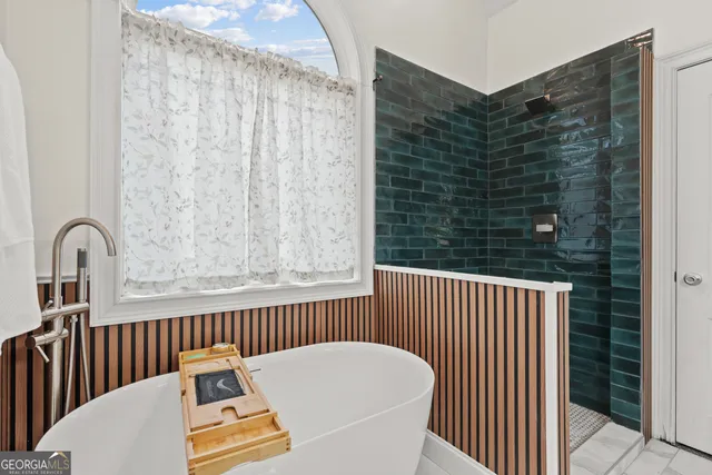 a view of a deck with a table and chairs