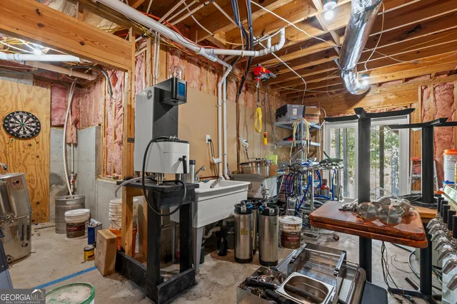an aerial view of a house with outdoor space