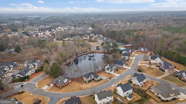 a view of a dining room with furniture wooden floor and a chandelier
