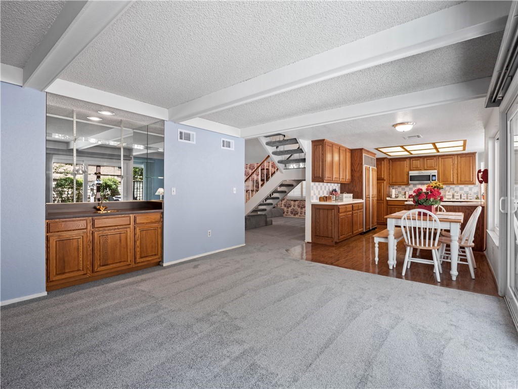 25656 Yucca Valley Road Valencia, CA 91355 - Photo 11 of 49 Family room has a wet bar