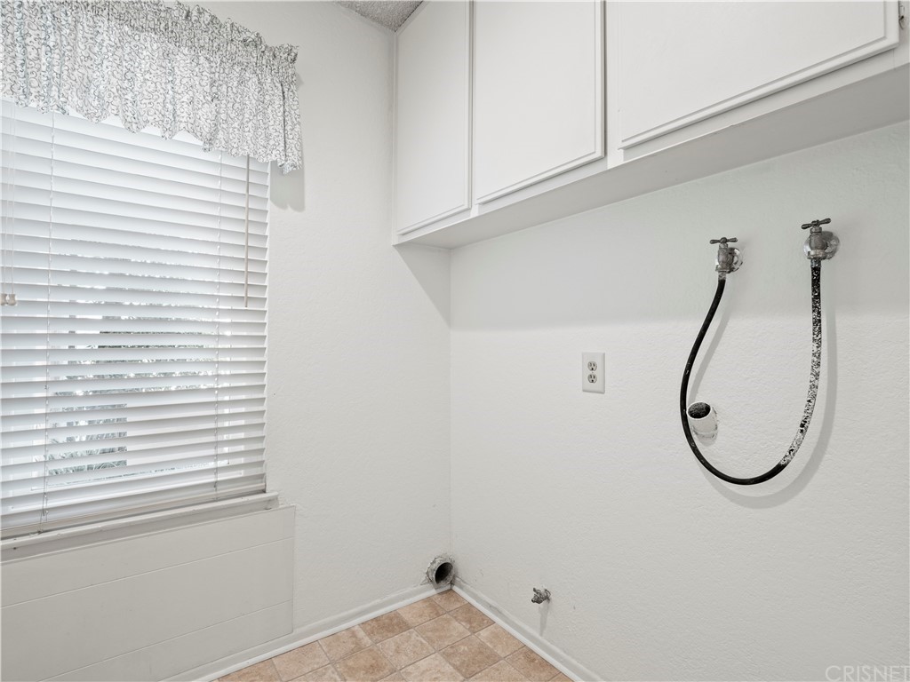 25656 Yucca Valley Road Valencia, CA 91355 - Photo 27 of 49 Laundry room full size