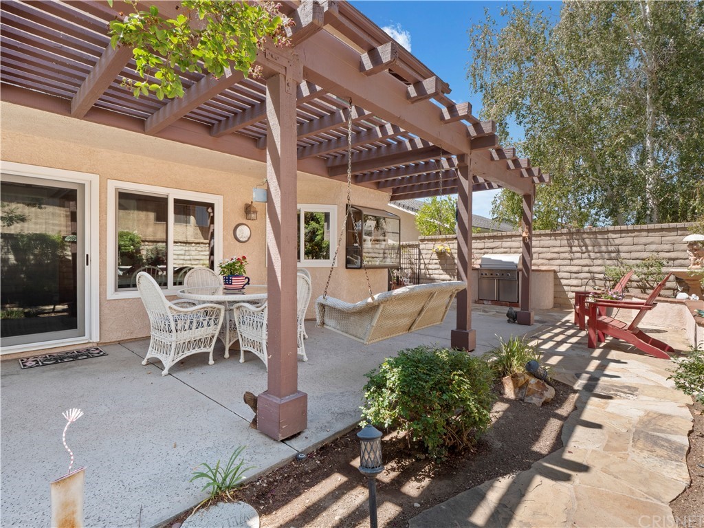25656 Yucca Valley Road Valencia, CA 91355 - Photo 31 of 49 Shady back patio with BBQ & swing