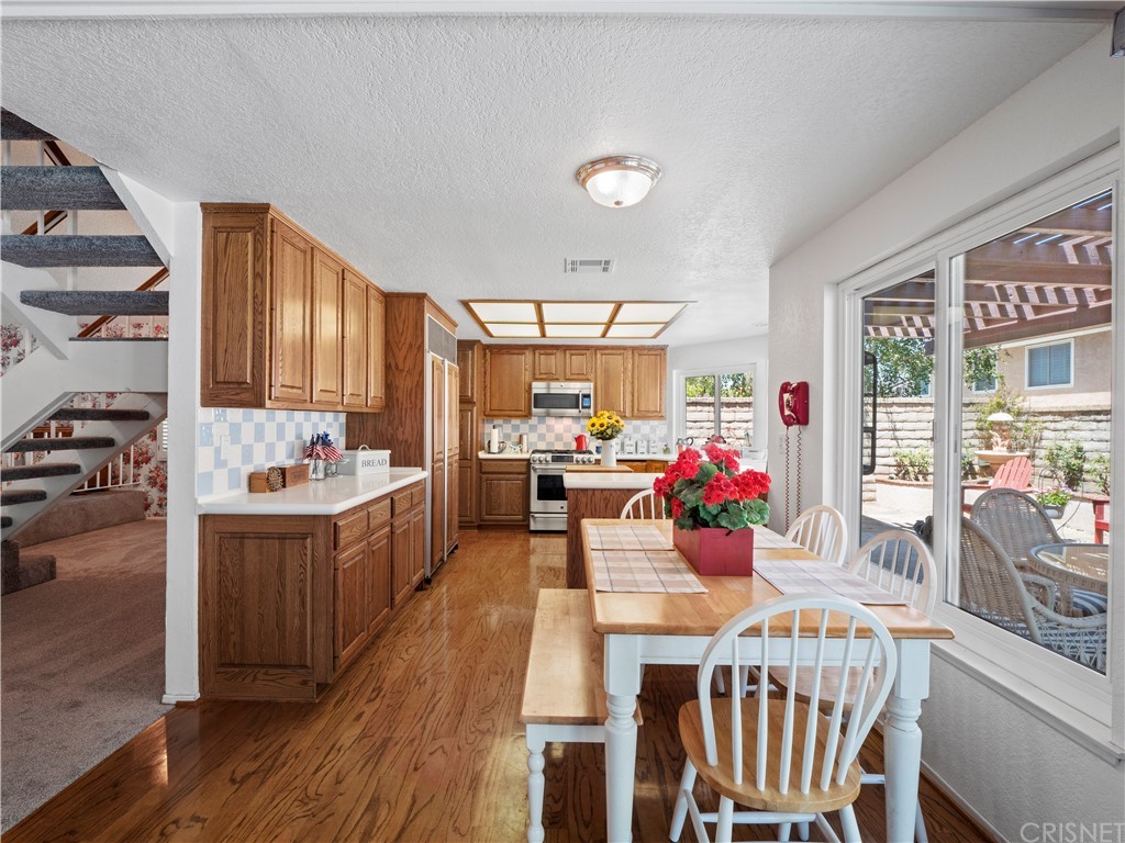 25656 Yucca Valley Road Valencia, CA 91355 - Photo 34 of 49 From family room to kitchen