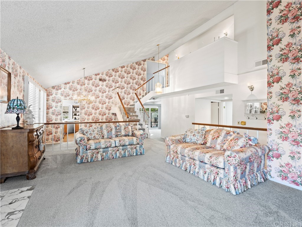 25656 Yucca Valley Road Valencia, CA 91355 - Photo 39 of 49 Living room front towards back