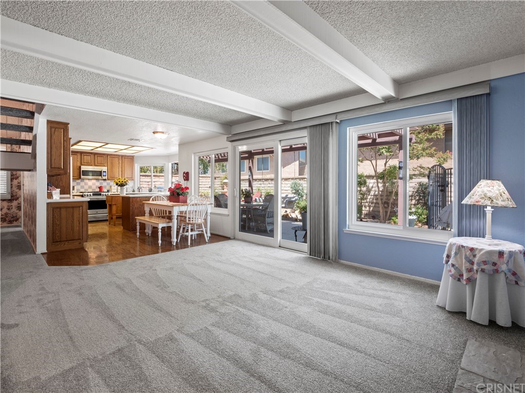 25656 Yucca Valley Road Valencia, CA 91355 - Photo 6 of 49 Open concept kitchen to family room with breakfast nook in between