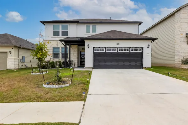 a view of a house with swimming pool