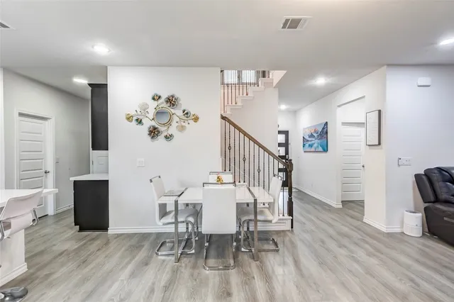 a view of a livingroom with furniture and furniture
