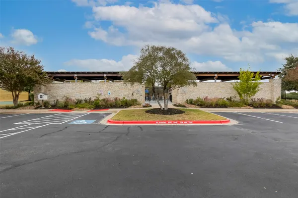 a view of the house with a swimming pool