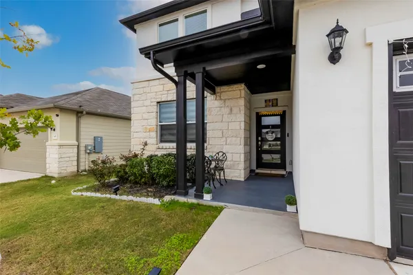 a house view with a garden space