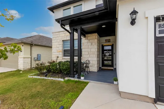 a house view with a garden space