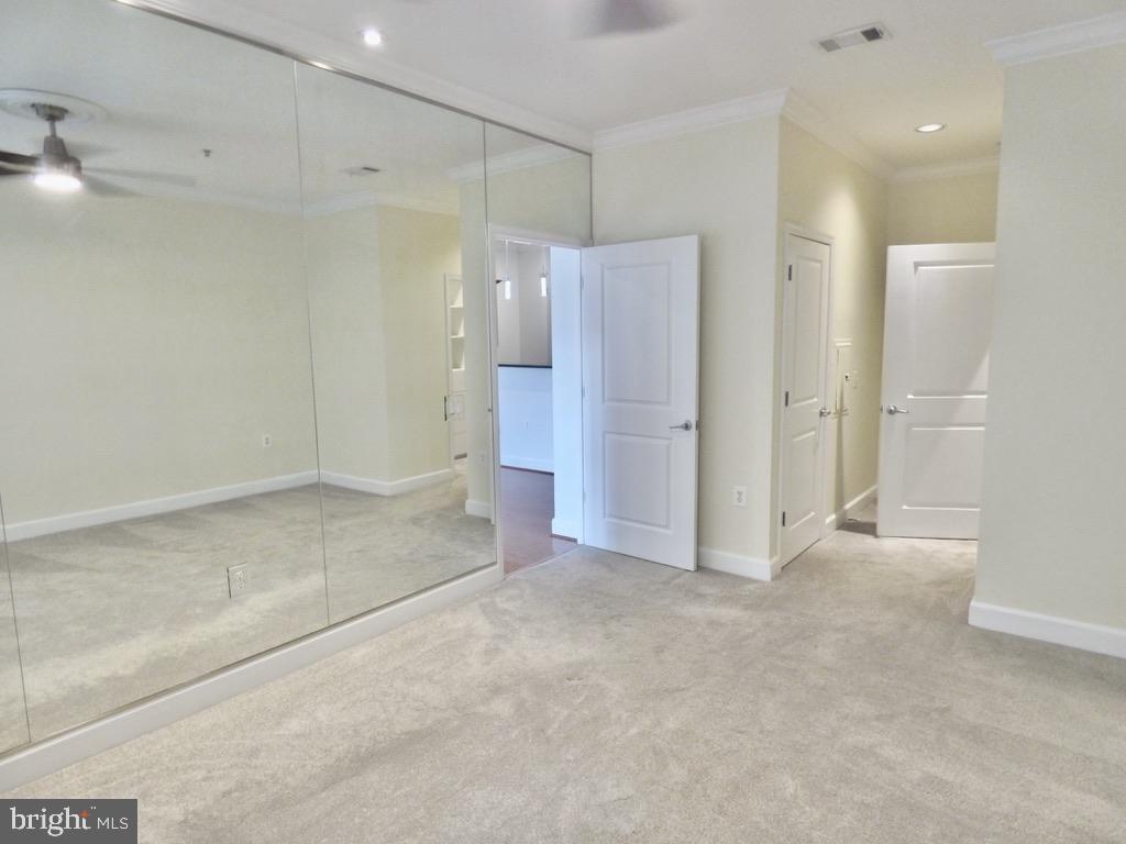 11800 Sunset Hills Road, Unit 118 Reston, VA 20190 - Photo 20 of 52 Spacious room with mirrored walls.