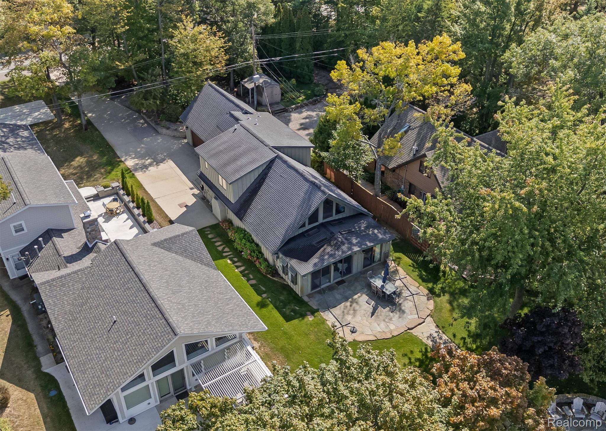 5892 Port Austin Road Caseville, MI 48725 - Photo 6 of 42 Drone / aerial view of a tree filled landscape