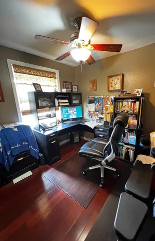 a bathroom with a toilet a sink and a mirror