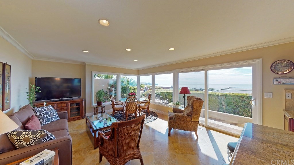 119 Monarch Bay Drive Dana Point, CA 92629 - Photo 17 of 24 a living room with furniture and a flat screen tv