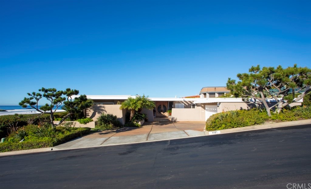 119 Monarch Bay Drive Dana Point, CA 92629 - Photo 2 of 24 a view of a house with a yard and sitting area
