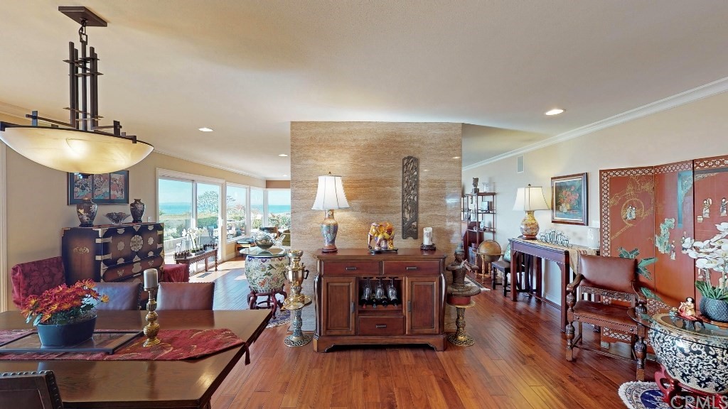119 Monarch Bay Drive Dana Point, CA 92629 - Photo 6 of 24 a very nice looking living room with a large window and wooden floor