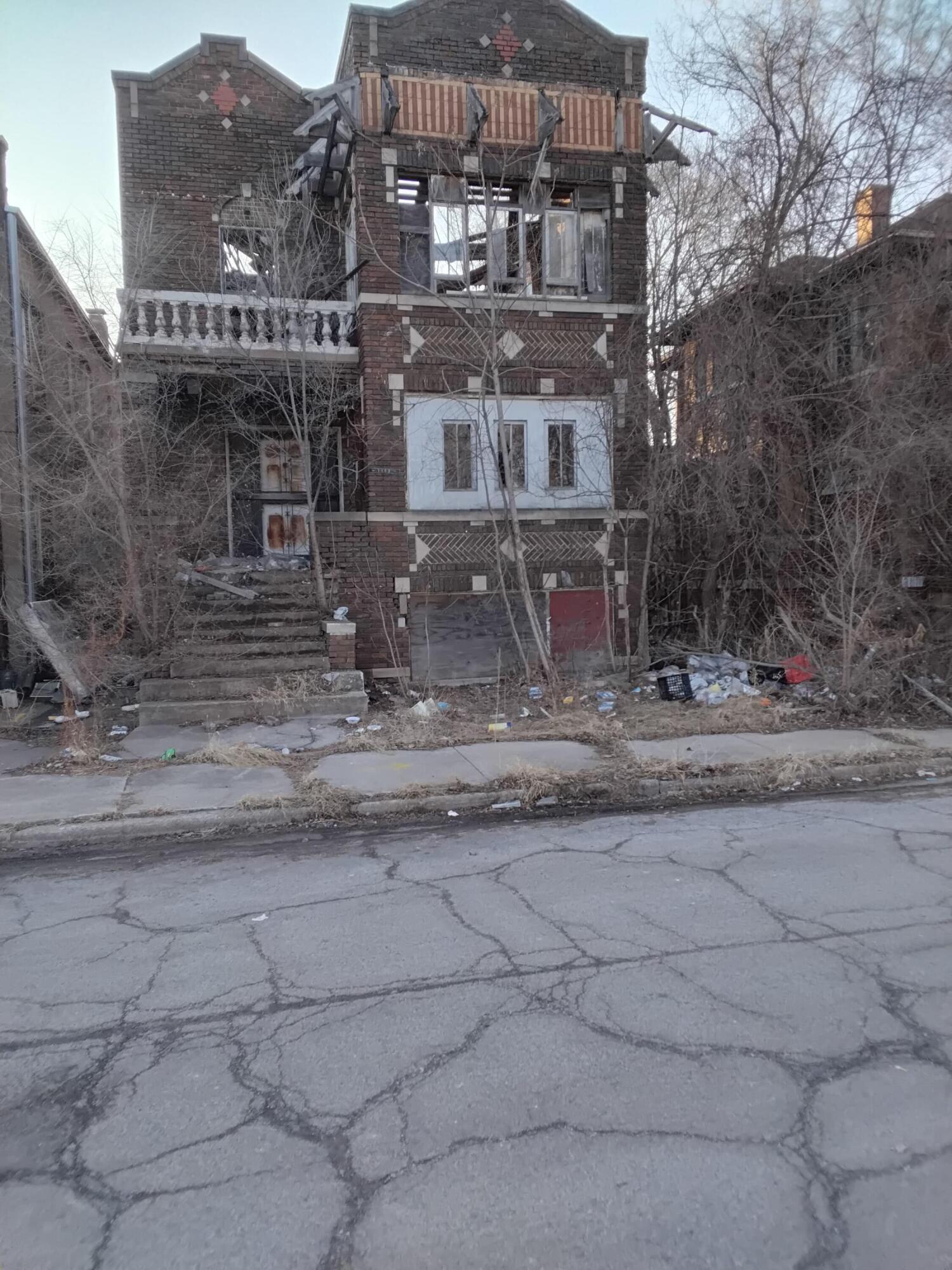 1400 Jackson Street Gary, IN 46407 - Photo 1 of 3 a view of a building with a yard