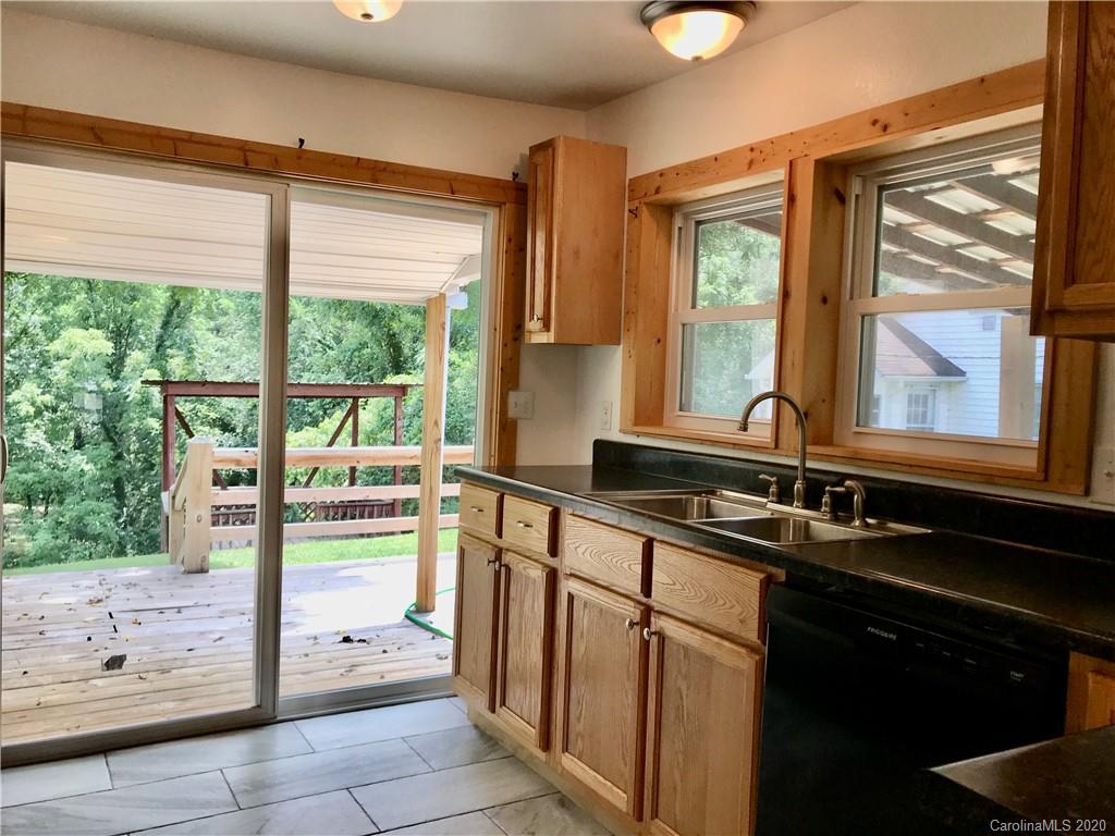 684 Holtzclaw Road Canton, NC 28716 - Photo 13 of 33 a kitchen with a sink and a window