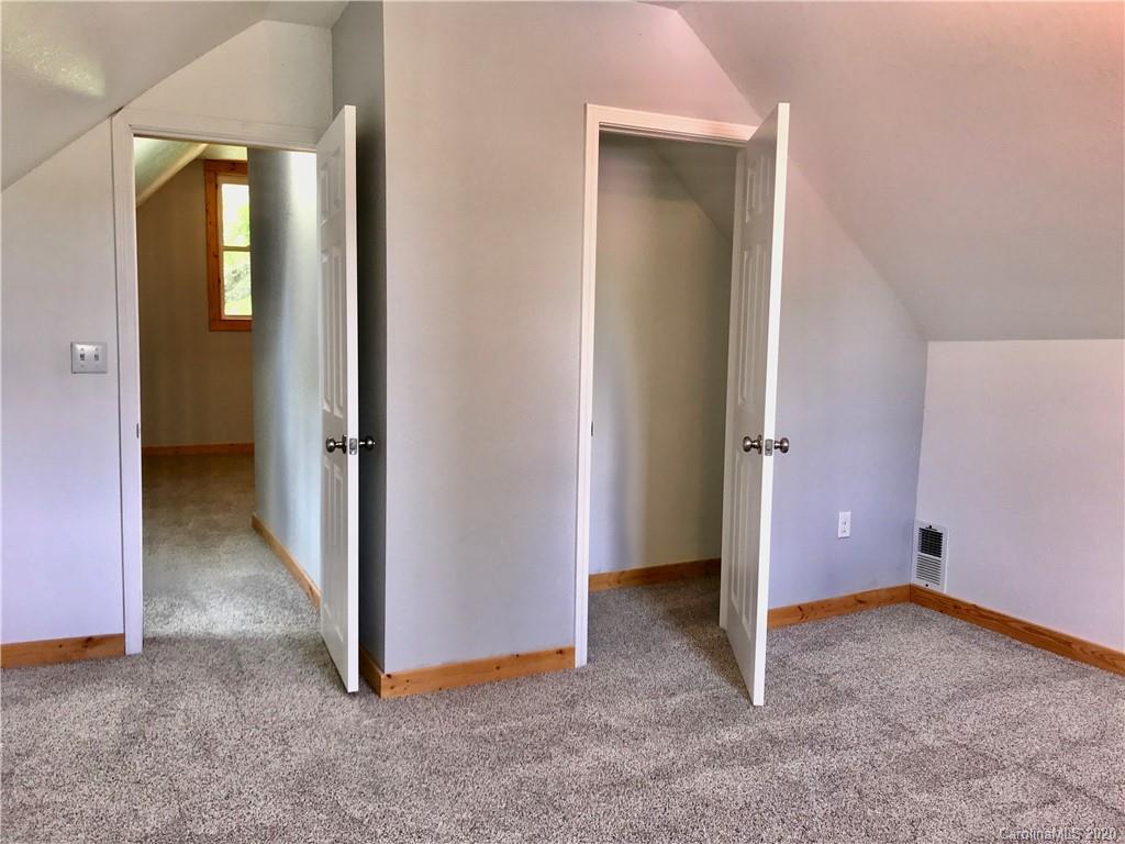 684 Holtzclaw Road Canton, NC 28716 - Photo 18 of 33 an empty room with closet
