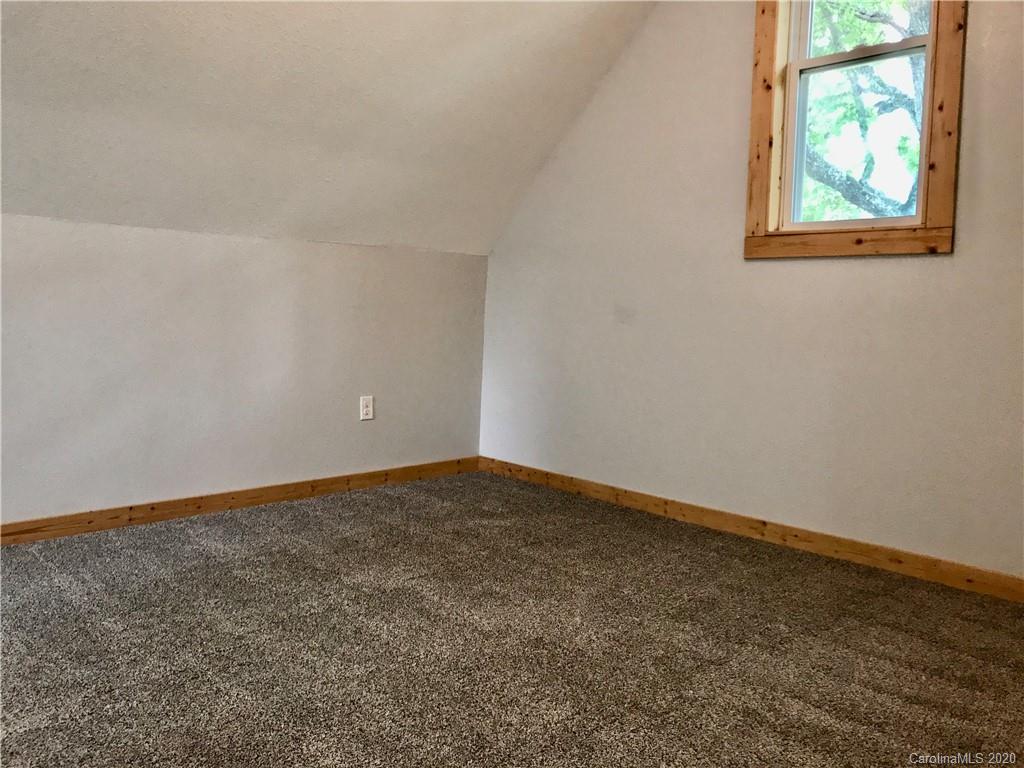 684 Holtzclaw Road Canton, NC 28716 - Photo 22 of 33 an empty room with windows