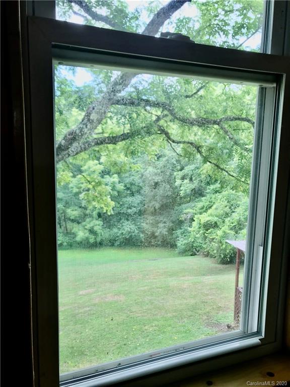 684 Holtzclaw Road Canton, NC 28716 - Photo 26 of 33 a view of a back yard from a window