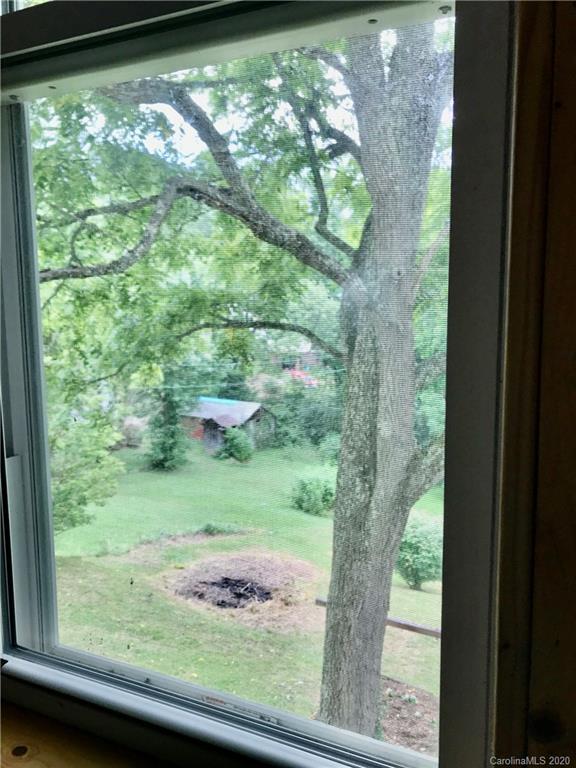 684 Holtzclaw Road Canton, NC 28716 - Photo 27 of 33 a view of a garden from a window