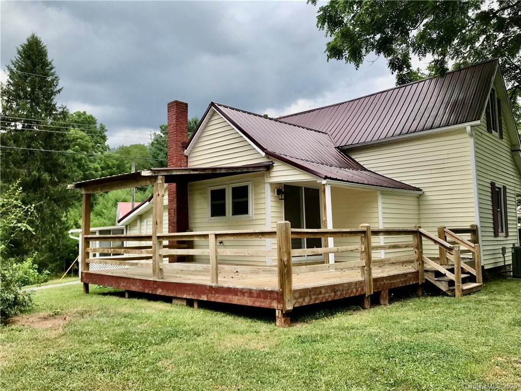 684 Holtzclaw Road Canton, NC 28716 - Photo 29 of 33 a view of a house with a yard