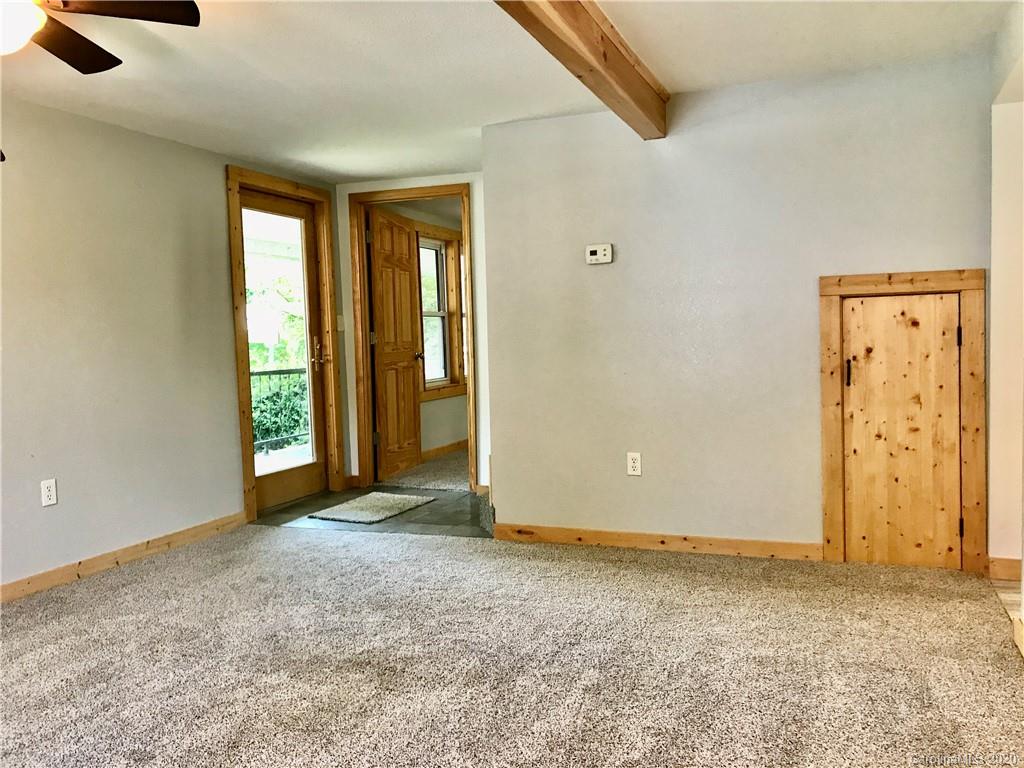 684 Holtzclaw Road Canton, NC 28716 - Photo 7 of 33 an empty room with windows and closet