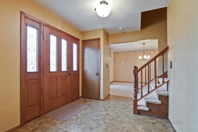 601 West Golf Road Libertyville, IL 60048 - Photo 2 of 27 a view of an entryway with staircase