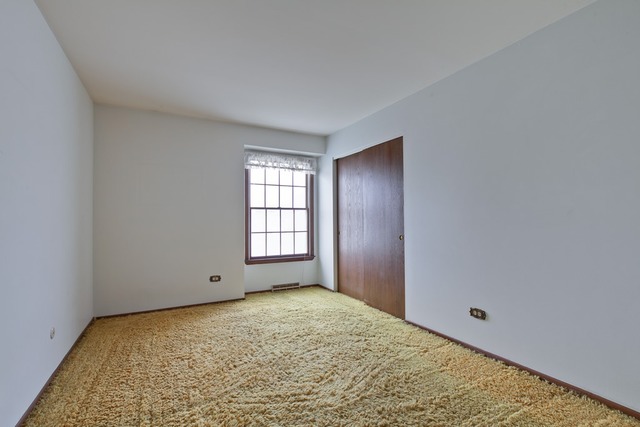 601 West Golf Road Libertyville, IL 60048 - Photo 22 of 27 a view of room with window and hardwood floor