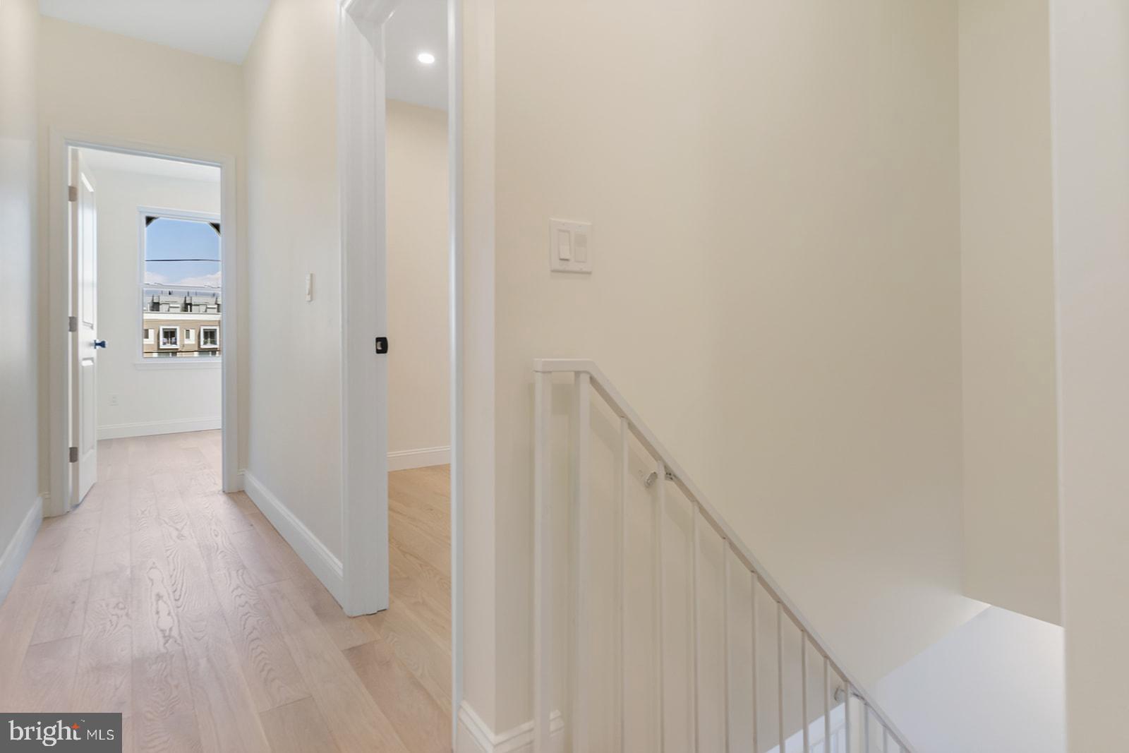 1644 North 6th Street Philadelphia, PA 19122 - Photo 24 of 52 a view of a hallway with wooden floor and entryway