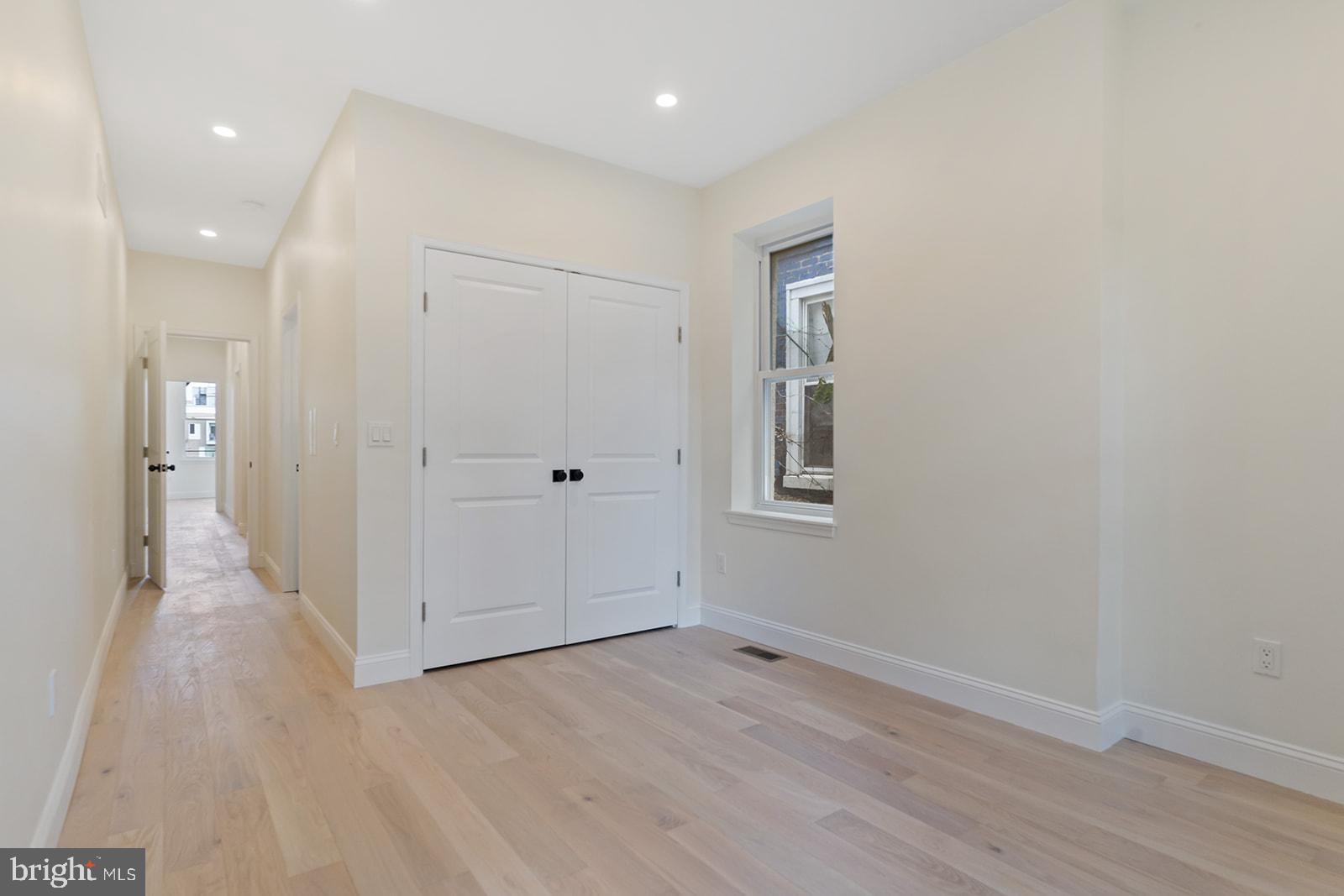1644 North 6th Street Philadelphia, PA 19122 - Photo 34 of 52 wooden floor in an empty room with a window