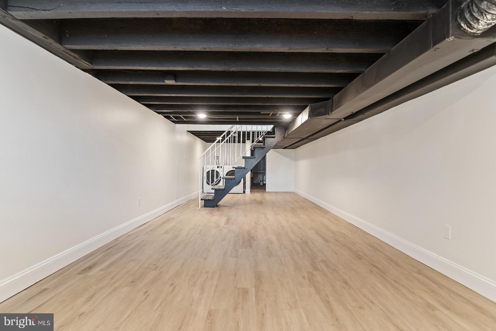 1644 North 6th Street Philadelphia, PA 19122 - Photo 46 of 52 a view of empty room with wooden floor