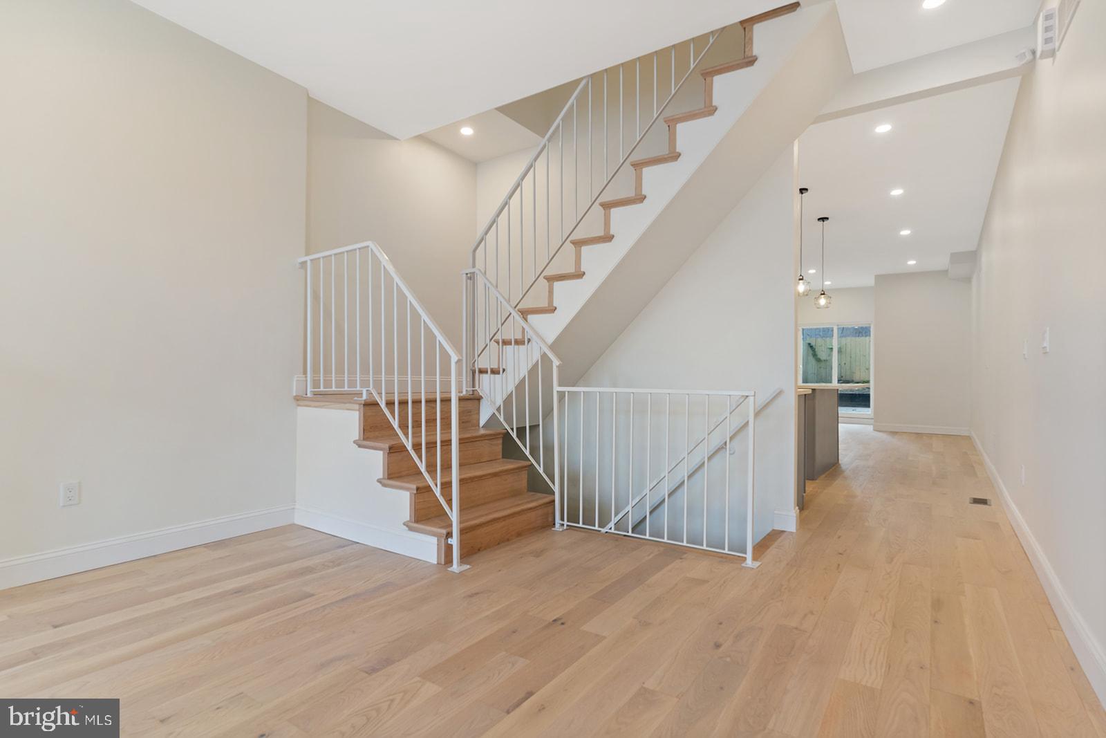 1644 North 6th Street Philadelphia, PA 19122 - Photo 10 of 52 a view of entryway and hall with wooden floor