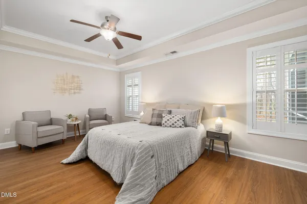 a bedroom with bed and a couch