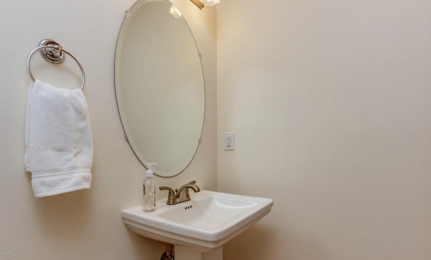 5777 Logan Road Lincoln City, OR 97367 - Photo 11 of 30 Powder Room Main Level